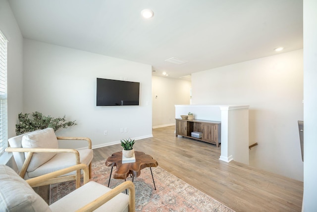 705 Squire Pope Rd, Summerville, SC 29486 - living area featuring light wood-style flooring, recessed lighting, and baseboards