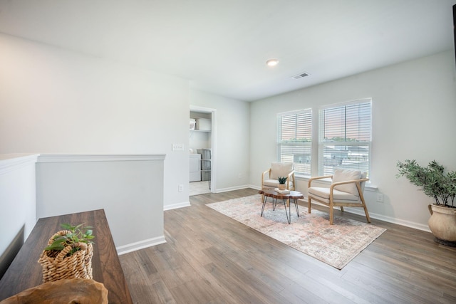 705 Squire Pope Rd, Summerville, SC 29486 - living area featuring washer / clothes dryer, wood finished floors, baseboards, and recessed lighting
