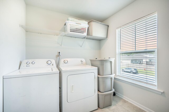 705 Squire Pope Rd, Summerville, SC 29486 - laundry area with separate washer and dryer, baseboards, and light tile patterned floors
