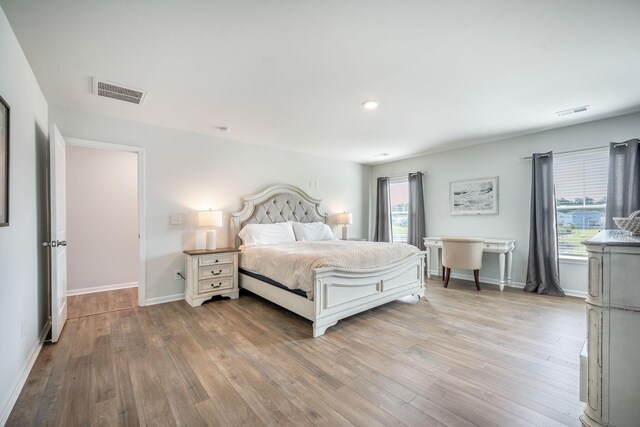 705 Squire Pope Rd, Summerville, SC 29486 - bedroom featuring light wood-type flooring and baseboards