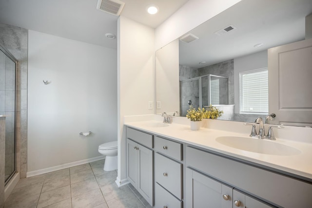705 Squire Pope Rd, Summerville, SC 29486 - full bath featuring toilet, a stall shower, double vanity, baseboards, and tile patterned floors