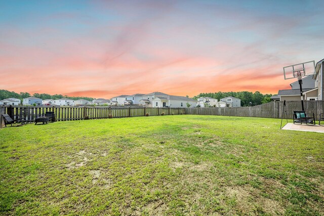 705 Squire Pope Rd, Summerville, SC 29486 - yard at dusk with a residential view and a patio area