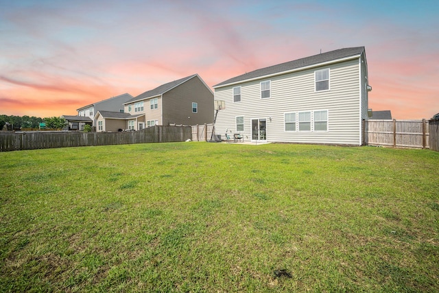 705 Squire Pope Rd, Summerville, SC 29486 - back of property at dusk with a patio