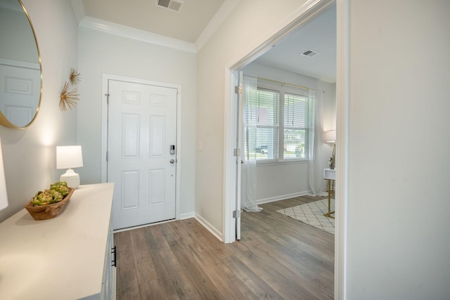 705 Squire Pope Rd, Summerville, SC 29486 - entrance foyer with dark wood-style flooring, baseboards, and crown molding