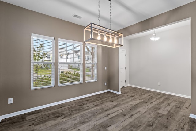 514 Purple Finch Rd, Summerville, SC 29486 - unfurnished dining area with dark wood finished floors and baseboards