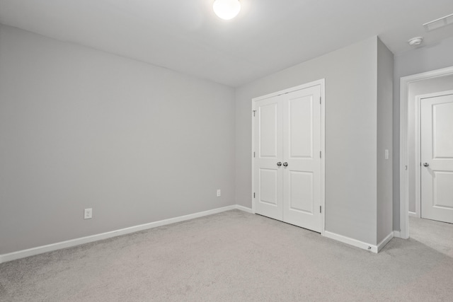 514 Purple Finch Rd, Summerville, SC 29486 - unfurnished bedroom with light colored carpet, baseboards, and a closet