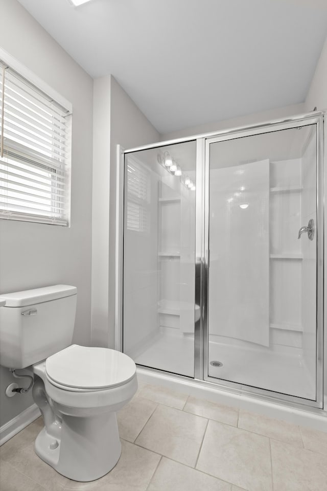 514 Purple Finch Rd, Summerville, SC 29486 - bathroom with toilet, a stall shower, and tile patterned floors