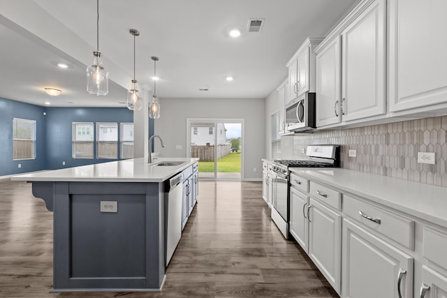 514 Purple Finch Rd, Summerville, SC 29486 - kitchen featuring appliances with stainless steel finishes, a sink, white cabinets, tasteful backsplash, and recessed lighting