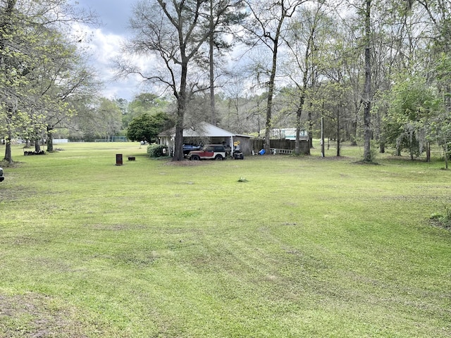 view of yard featuring a carport