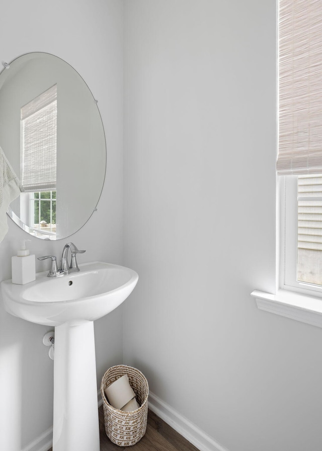 1825 Crossbill Trl, Hanahan, SC 29410 - bathroom featuring wood finished floors, baseboards, and a sink