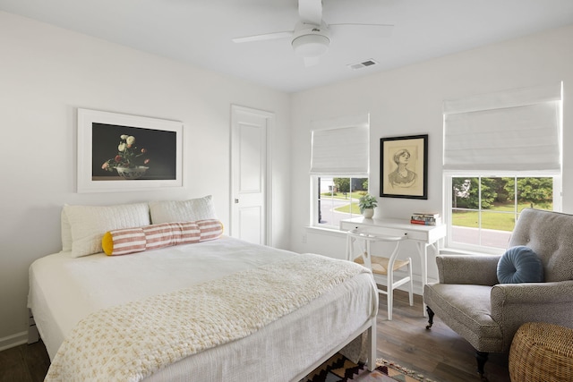 1825 Crossbill Trl, Hanahan, SC 29410 - bedroom with multiple windows, wood finished floors, and baseboards