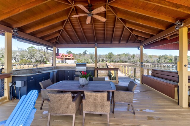 deck with a gazebo, ceiling fan, and sink