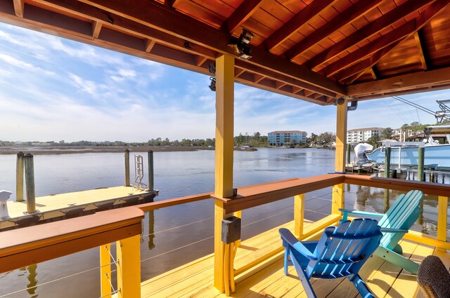 dock area with a water view