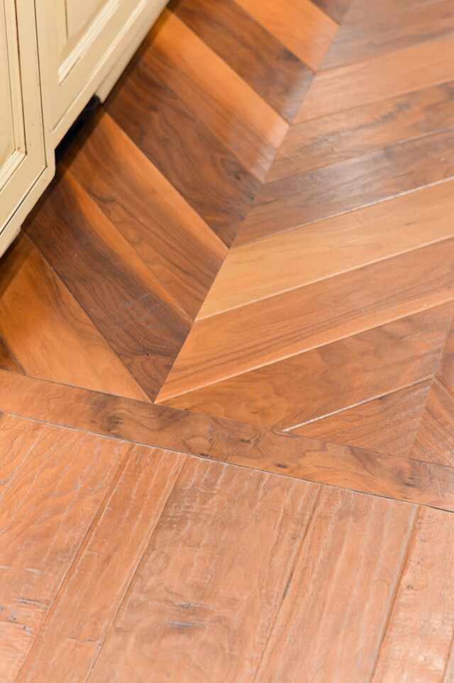 details with light parquet flooring