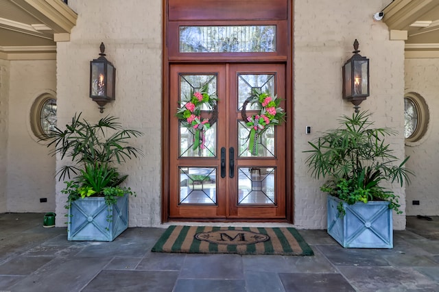 entrance to property featuring french doors