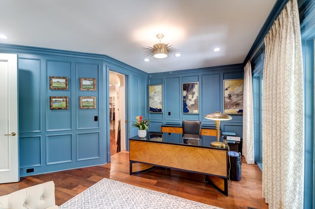 home office with dark wood-type flooring