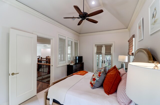 bedroom featuring lofted ceiling, ceiling fan, light wood-type flooring, french doors, and ornamental molding