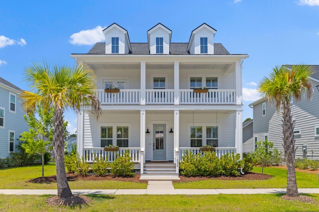 1828 Agate Bay Dr, Mount Pleasant, SC 29466 - view of front of property with covered porch, a balcony, and a front lawn