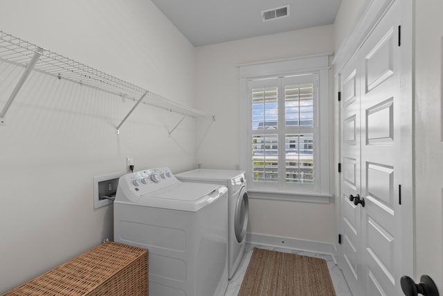 1828 Agate Bay Dr, Mount Pleasant, SC 29466 - washroom featuring washing machine and clothes dryer and baseboards