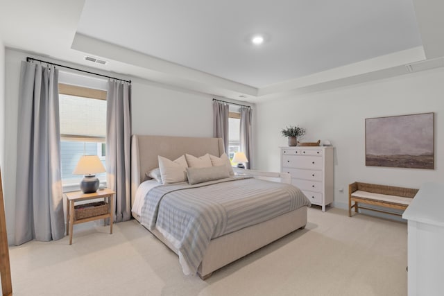 1828 Agate Bay Dr, Mount Pleasant, SC 29466 - bedroom featuring a tray ceiling, light colored carpet, and recessed lighting