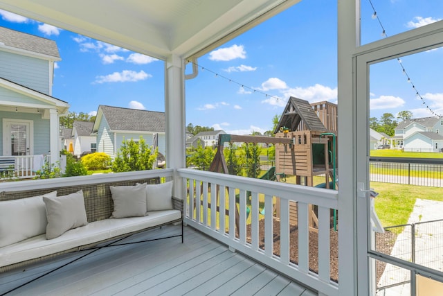 1828 Agate Bay Dr, Mount Pleasant, SC 29466 - wooden deck with a playground, a residential view, and an outdoor hangout area