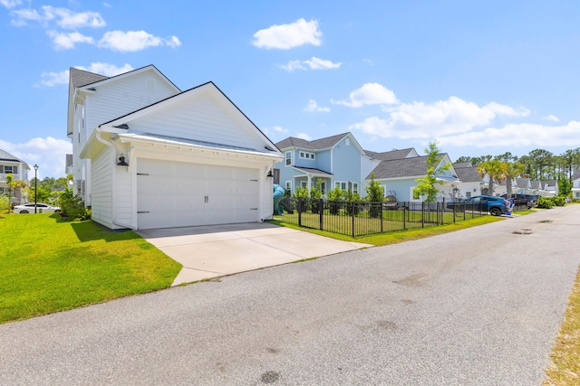 1828 Agate Bay Dr, Mount Pleasant, SC 29466 - traditional-style house with a residential view, concrete driveway, and a garage