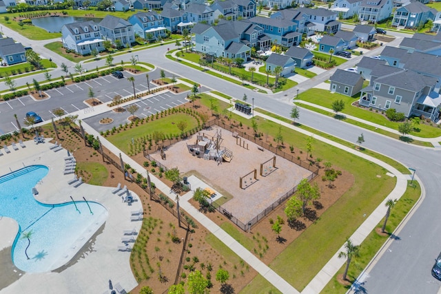 1828 Agate Bay Dr, Mount Pleasant, SC 29466 - aerial perspective of suburban area featuring a pool and a nearby body of water