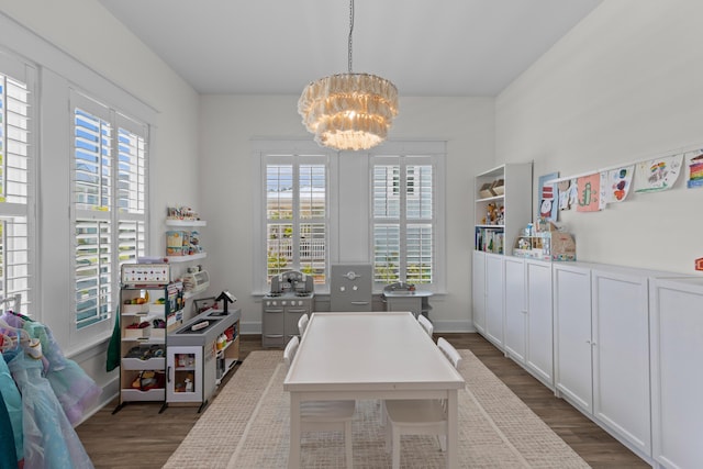 1828 Agate Bay Dr, Mount Pleasant, SC 29466 - dining area with dark wood-style flooring, a chandelier, and an office area