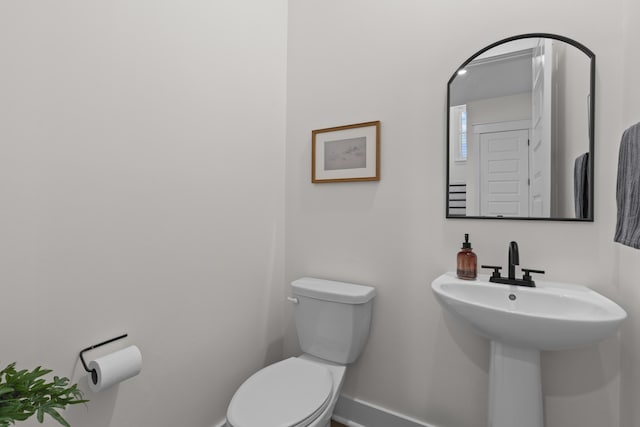1828 Agate Bay Dr, Mount Pleasant, SC 29466 - bathroom with baseboards, toilet, and a sink