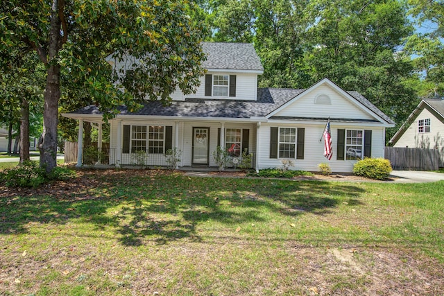 2916 Shadow Ln, North Charleston, SC 29406 - traditional-style house with a porch and roof with shingles