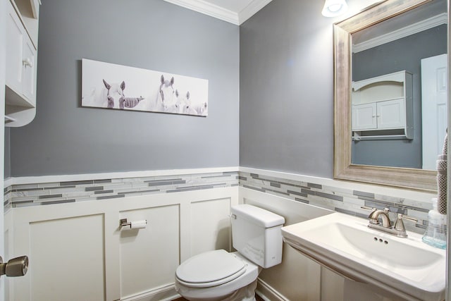 2916 Shadow Ln, North Charleston, SC 29406 - bathroom with ornamental molding, a sink, toilet, and wainscoting