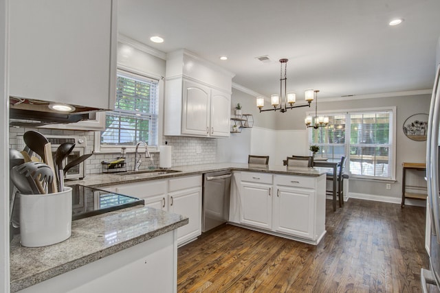 2916 Shadow Ln, North Charleston, SC 29406 - kitchen with a sink, stainless steel dishwasher, ornamental molding, white cabinets, and a peninsula
