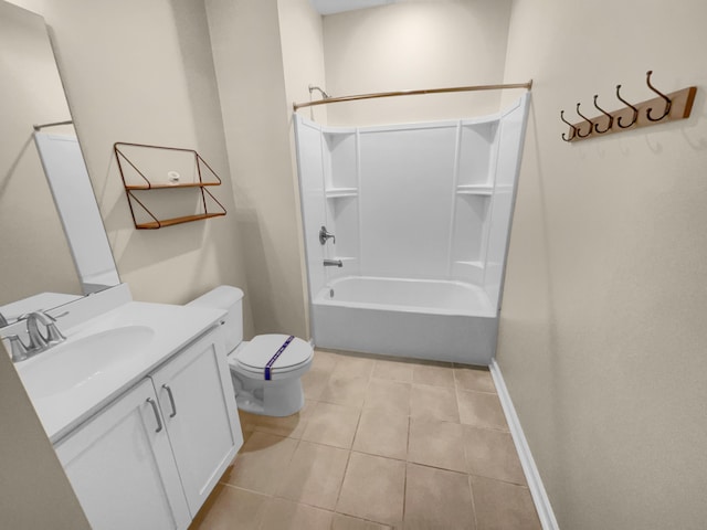 full bathroom with tile patterned flooring, baseboards, toilet, bathing tub / shower combination, and vanity