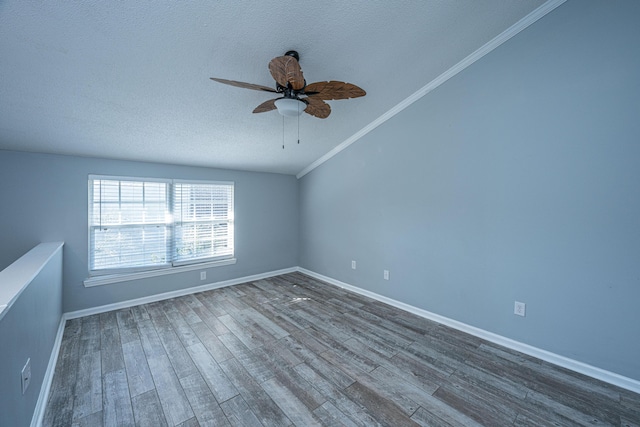 unfurnished room featuring hardwood / wood-style floors, ornamental molding, a textured ceiling, and ceiling fan