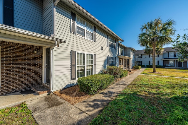 exterior space featuring a lawn