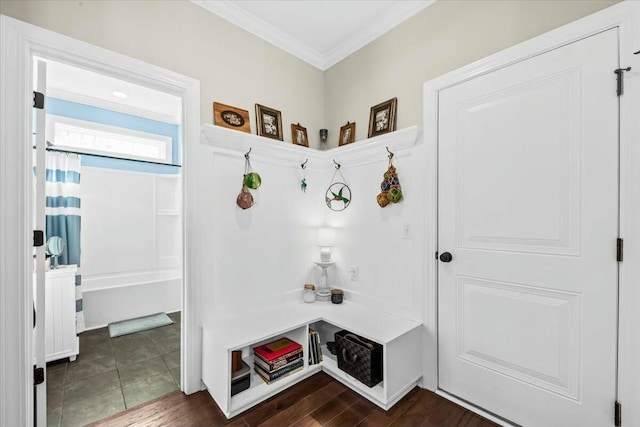 mudroom with dark hardwood / wood-style flooring and crown molding