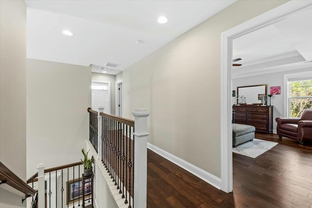 hallway with dark hardwood / wood-style floors