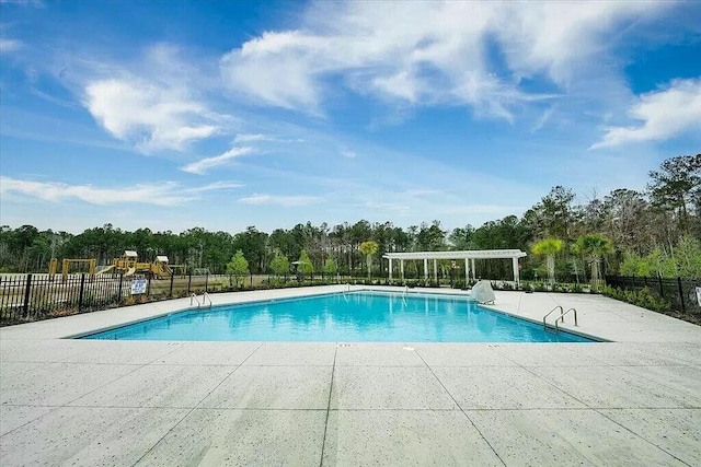 view of pool featuring a patio