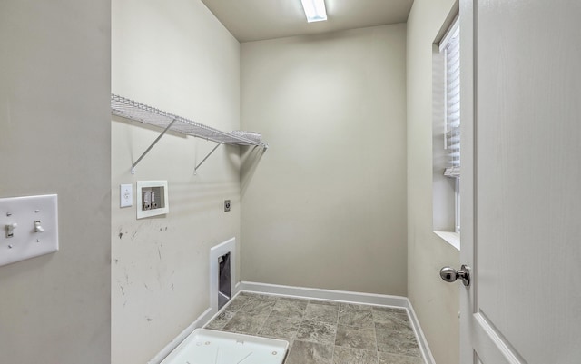 laundry area featuring washer hookup, laundry area, electric dryer hookup, and baseboards