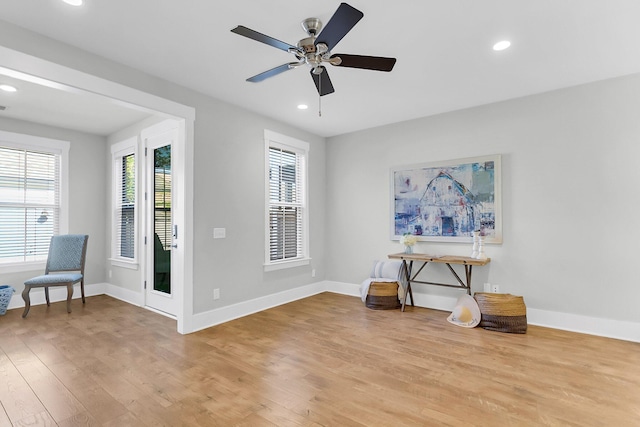 interior space featuring light hardwood / wood-style flooring and ceiling fan