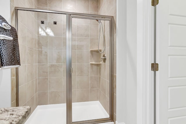 bathroom featuring an enclosed shower