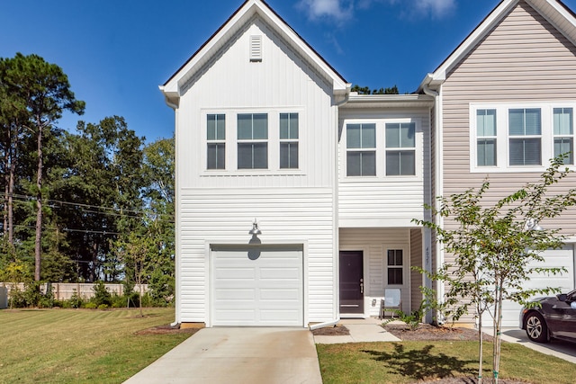 view of front facade featuring a front yard and a garage