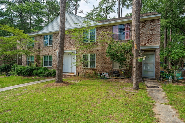306 Crestview Dr Unit C, Summerville, SC 29485 - view of front of home featuring a front yard and brick siding