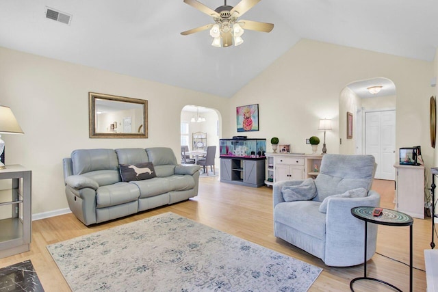 104 Lancaster Ct, Goose Creek, SC 29445 - living area with arched walkways, ceiling fan, vaulted ceiling, and wood finished floors