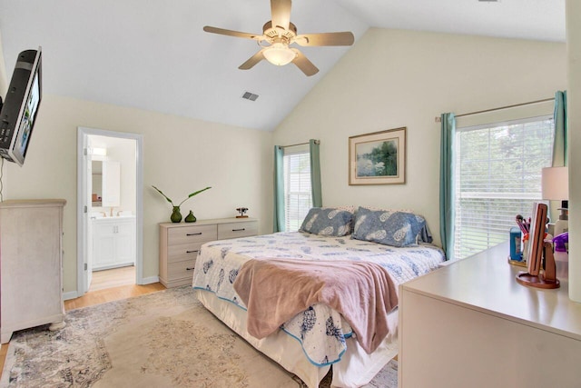 104 Lancaster Ct, Goose Creek, SC 29445 - bedroom featuring light wood-style flooring, high vaulted ceiling, connected bathroom, and a ceiling fan
