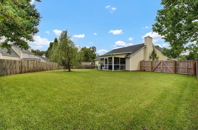 104 Lancaster Ct, Goose Creek, SC 29445 - fenced backyard with a sunroom