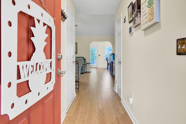 104 Lancaster Ct, Goose Creek, SC 29445 - hall with arched walkways and light wood-style floors