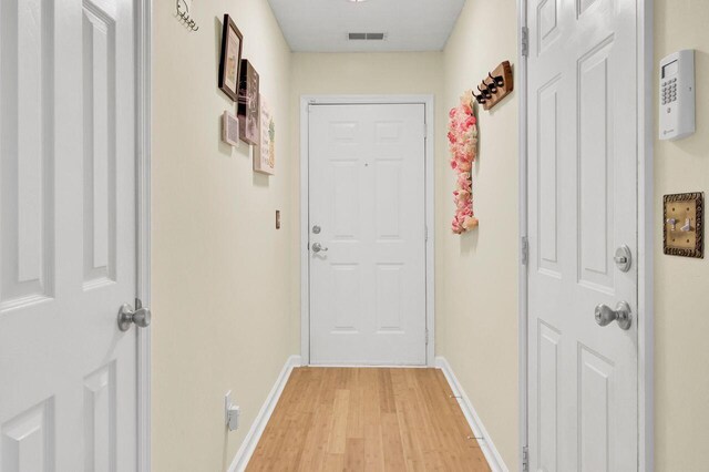 104 Lancaster Ct, Goose Creek, SC 29445 - doorway to outside with light wood-type flooring and baseboards