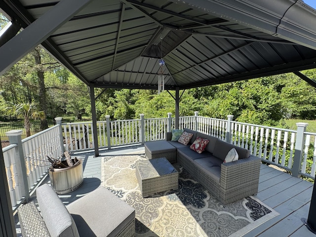 deck with an outdoor hangout area and a gazebo