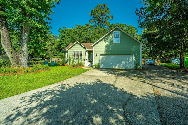 front of property with a garage and a front yard